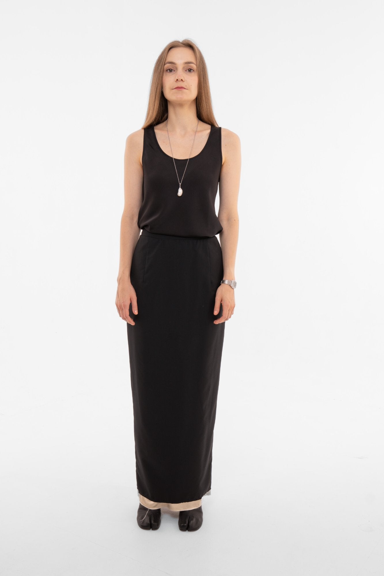 Black maxi pencil skirt front view with high waistband - elegant designer skirt for office and evening - Sazha Barcelona
