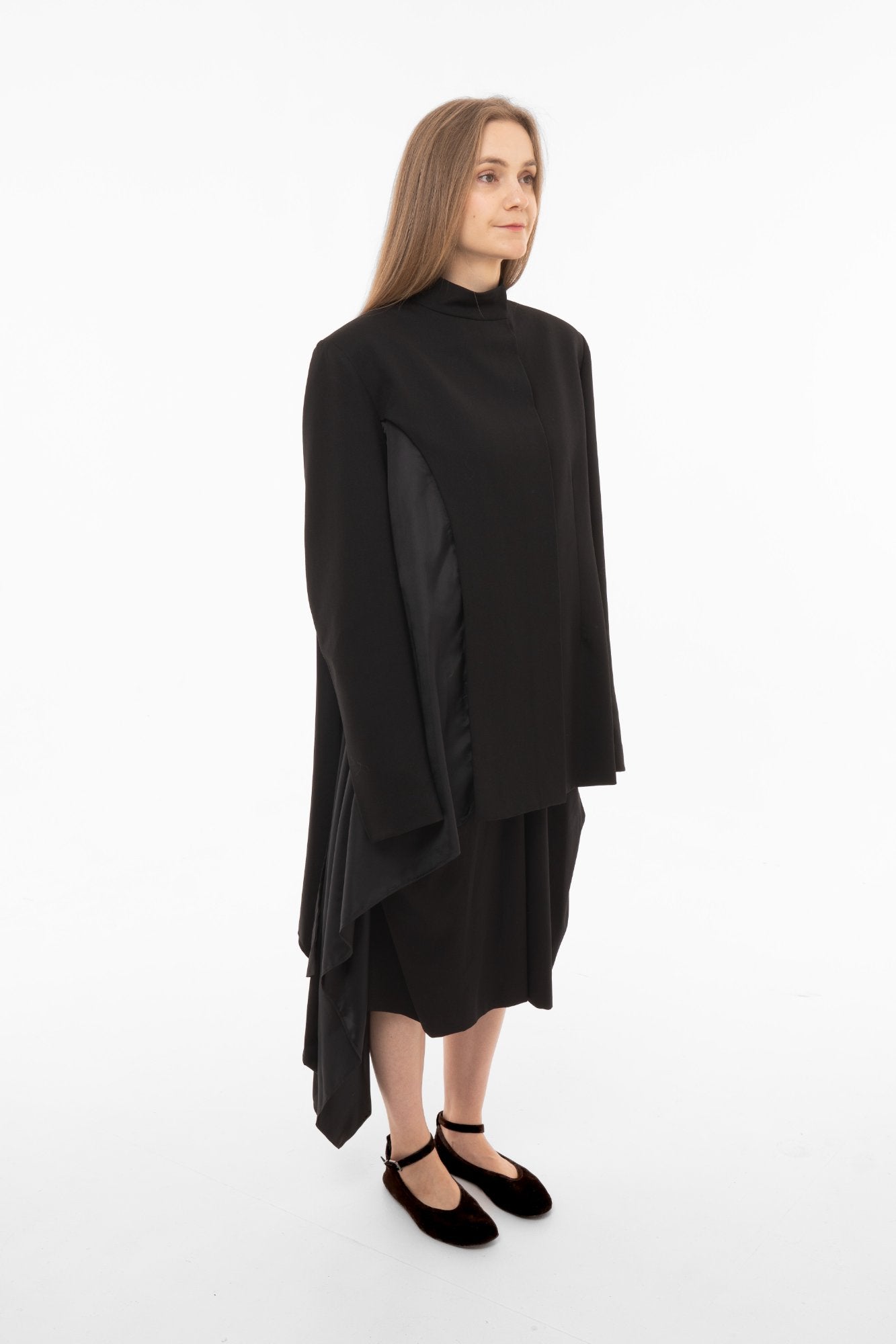 Architectural black blazer with stand collar sculptural draping and asymmetric satin lining - made in Barcelona