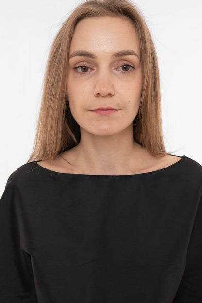 Neckline close-up of silk taffeta cropped top 