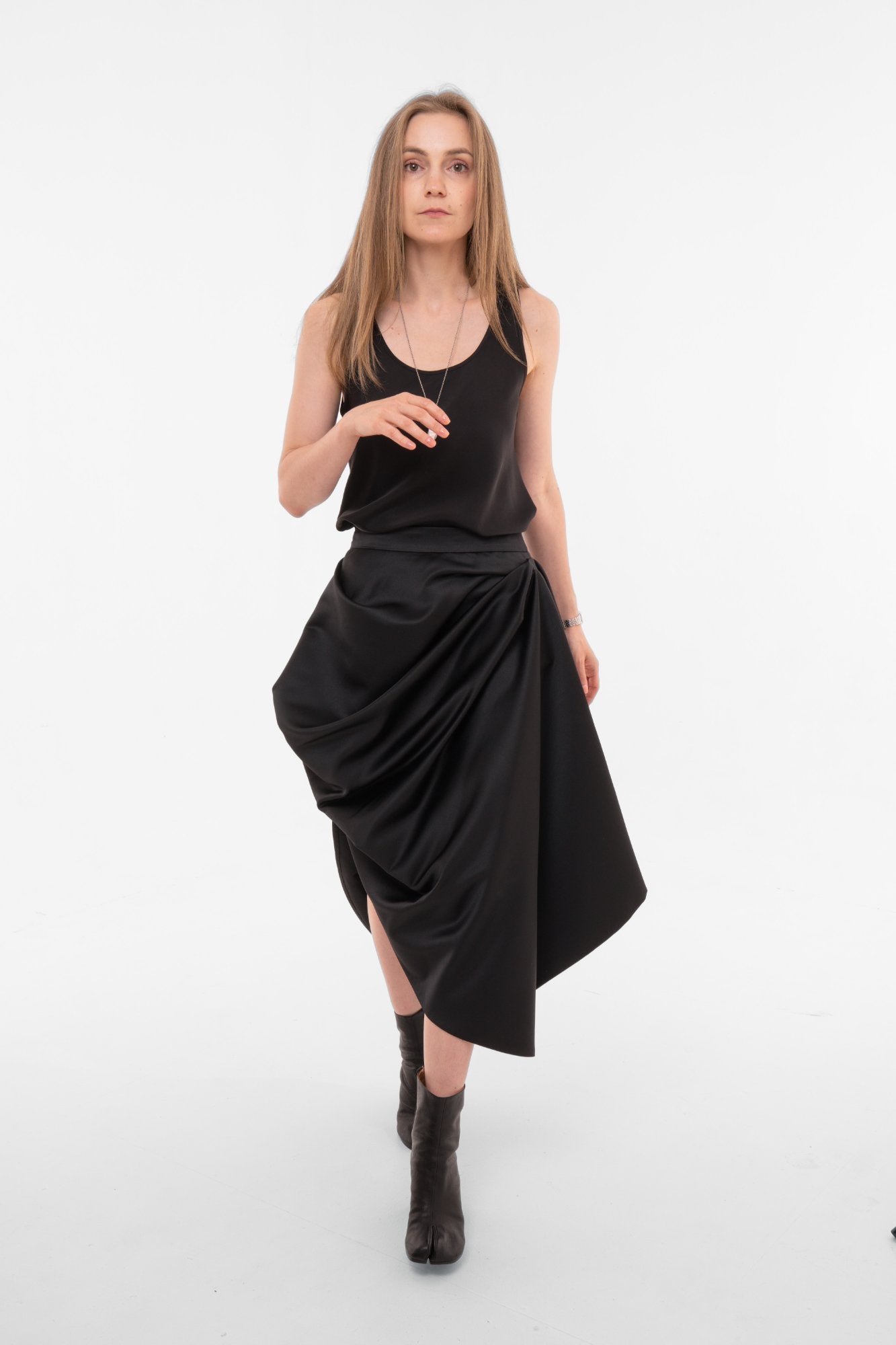 Black asymmetric maxi skirt with dramatic overlay draping